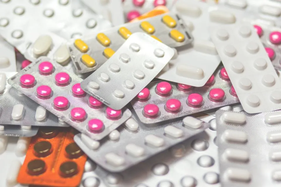 Pink tablets in blister packs